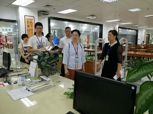 北海市创城办调研组到北海市图书馆调研场馆建设情况